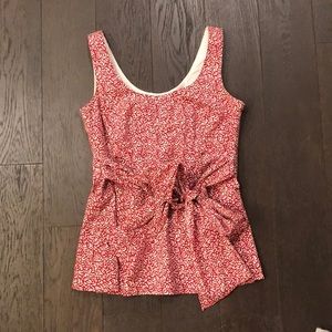 Red and white patterned blouse